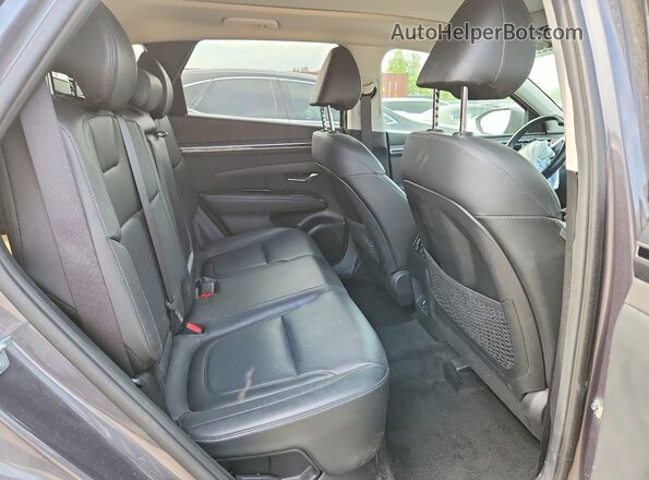 KM8JCCA12PU132471 2023 HYUNDAI TUCSON Gray Rear interior view