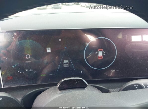 KM8JEDD19SU337841 2025 HYUNDAI TUCSON HYBRID Gray Rear seats view