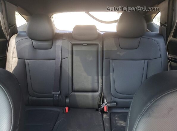 KM8JF3DEXRU276391 2024 HYUNDAI TUCSON White Rear seats view
