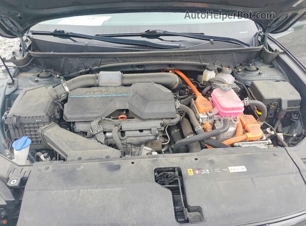 KM8JFCA19PU090632 2023 HYUNDAI TUCSON Green Vista del compartimento del motor