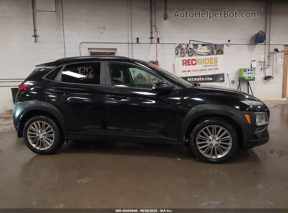 KM8K2CAA0JU145847 2018 HYUNDAI KONA Black Rear interior view