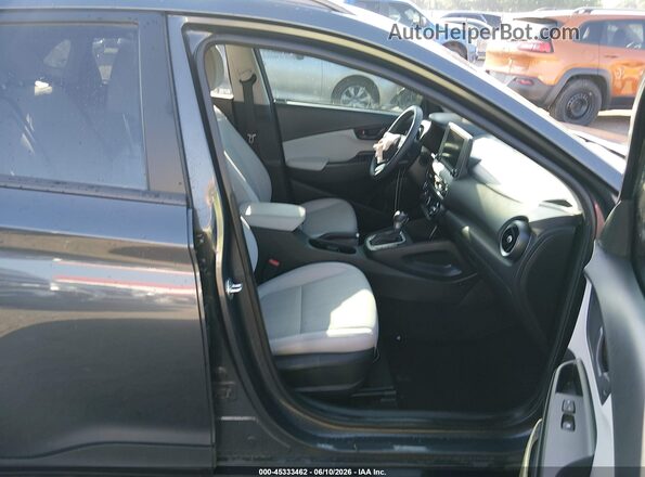 KM8K62AB9PU937883 2023 HYUNDAI KONA Серый Вид салона спереди