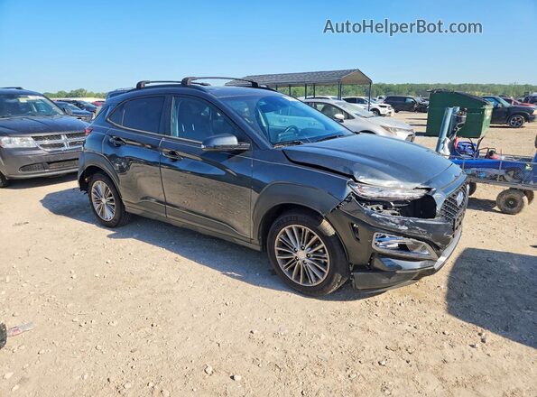 KM8K6CAA9MU614698 2021 HYUNDAI KONA Gray Delantero derecho