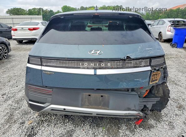 KM8KN4AE3NU080675 2022 HYUNDAI IONIQ Blue Rear view