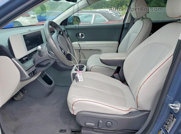 KM8KN4AE3NU080675 2022 HYUNDAI IONIQ Blue Front interior view