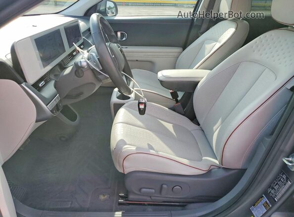 KM8KN4AE8NU097049 2022 HYUNDAI IONIQ Gray Vista interior delantera