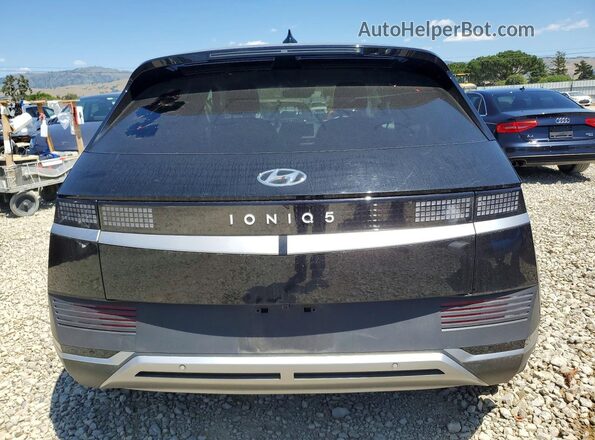 KM8KN4DEXRU263167 2024 HYUNDAI IONIQ Black უკანა ხედი