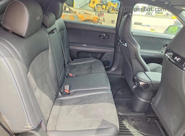 KM8KNDA87SU006729 2025 HYUNDAI IONIQ Black Вид задніх сидінь