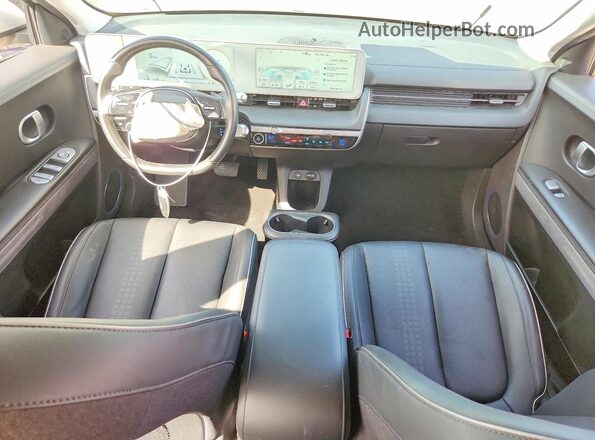 KM8KNDAF0PU228602 2023 HYUNDAI IONIQ Серебряный Вид панели приборов