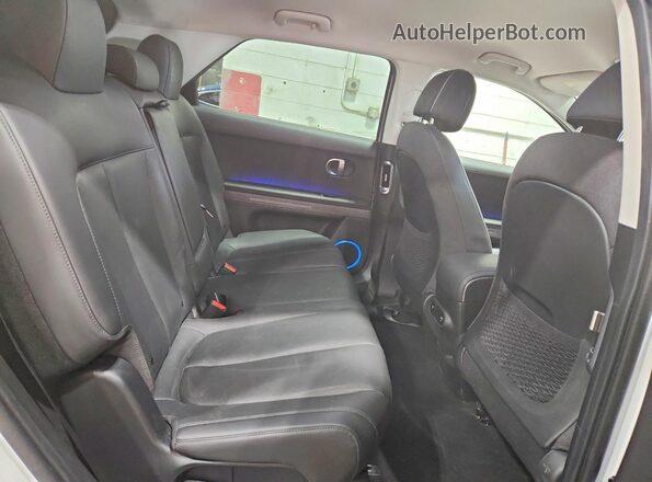 KM8KNDAF0PU230673 2023 HYUNDAI IONIQ White Սալոնի հետևի տեսք