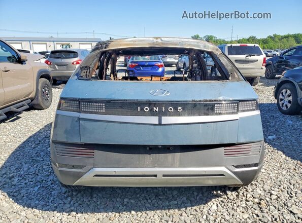 KM8KNDAF6PU203090 2023 HYUNDAI IONIQ Blue Widok z tyłu