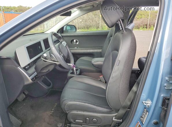 KM8KNDAF8PU173252 2023 HYUNDAI IONIQ Blue Front interior view