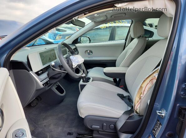 KM8KNDAFXNU112417 2022 HYUNDAI IONIQ Blue Front interior view