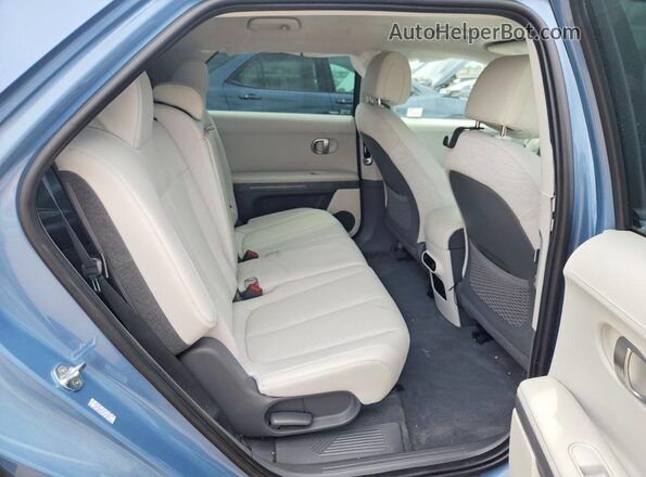 KM8KNDAFXNU112417 2022 HYUNDAI IONIQ Blue Rear seats view