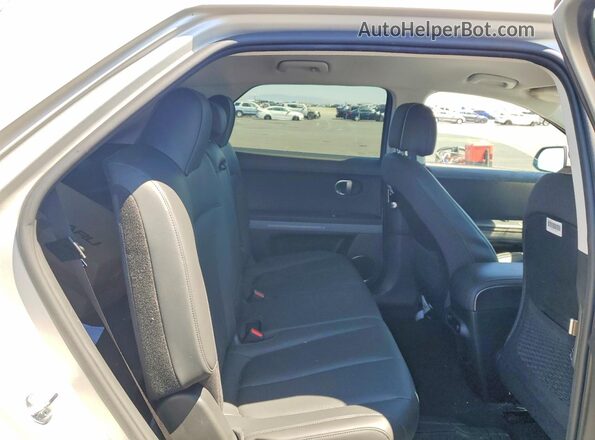 KM8KNDAFXPU176945 2023 HYUNDAI IONIQ Silver Вид задньої частини салону