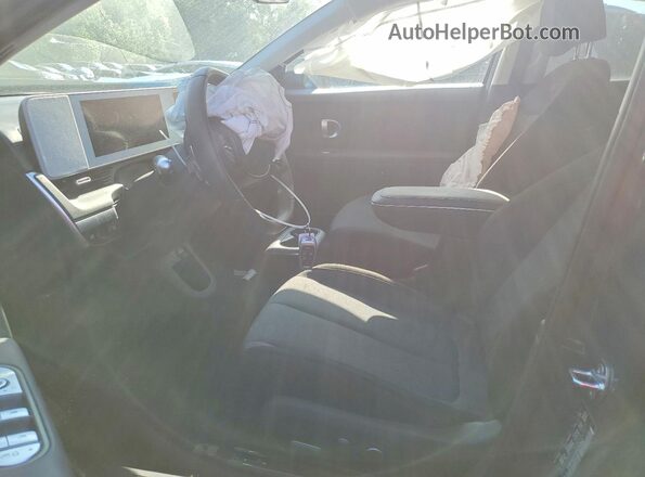 KM8KNDDFXRU257202 2024 HYUNDAI IONIQ Gray Front interior view