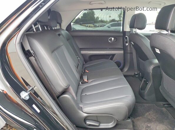 KM8KRDAFXPU207941 2023 HYUNDAI IONIQ Black Vista interior trasera