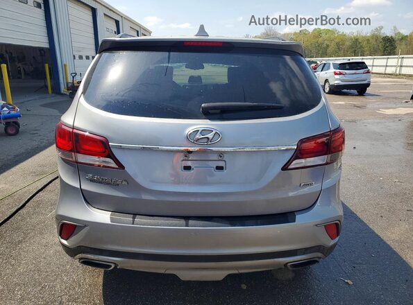 KM8SMDHFXJU257914 2018 HYUNDAI SANTA Silver Rear view