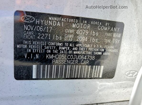 KMHC05LC0JU064738 2018 HYUNDAI IONIQ White VIN sticker view