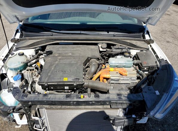 KMHC05LC0JU064738 2018 HYUNDAI IONIQ White Rear interior view