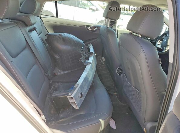 KMHC05LC0JU064738 2018 HYUNDAI IONIQ White Rear seats view