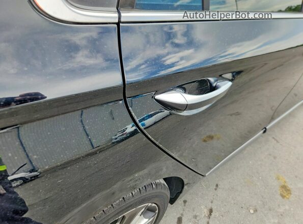 KMHC05LC1JU073142 2018 HYUNDAI IONIQ Black Vista de los asientos traseros