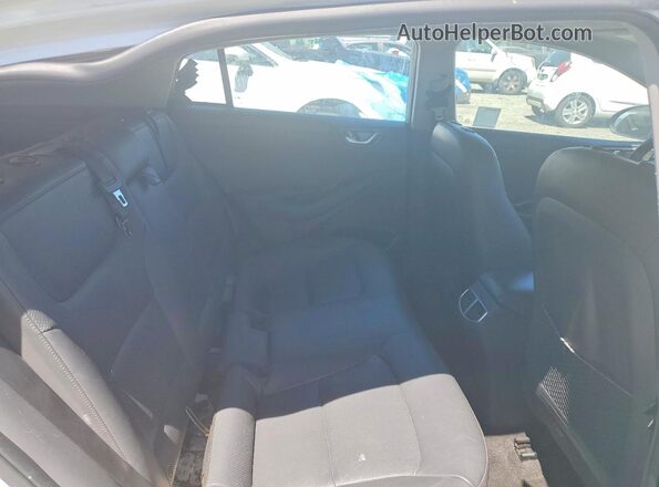 KMHC05LC4LU235140 2020 HYUNDAI IONIQ White Rear seats view
