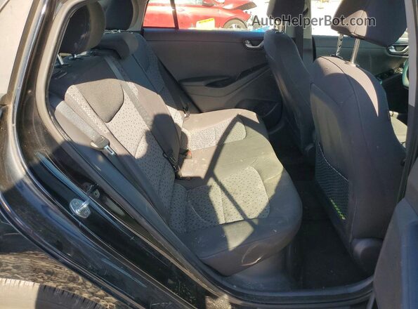 KMHC65LC1JU075777 2018 HYUNDAI IONIQ Black Vista de los asientos traseros
