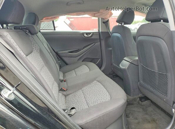 KMHC65LC1JU075794 2018 HYUNDAI IONIQ Black Vista de los asientos traseros