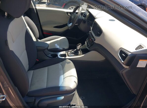 KMHC65LC3KU117593 2019 HYUNDAI IONIQ HYBRID Серый Вид салона спереди