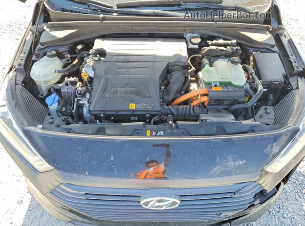 KMHC65LC5HU035986 2017 HYUNDAI IONIQ Charcoal Вид задньої частини салону