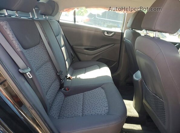 KMHC65LC9JU076708 2018 HYUNDAI IONIQ Black Rear seats view