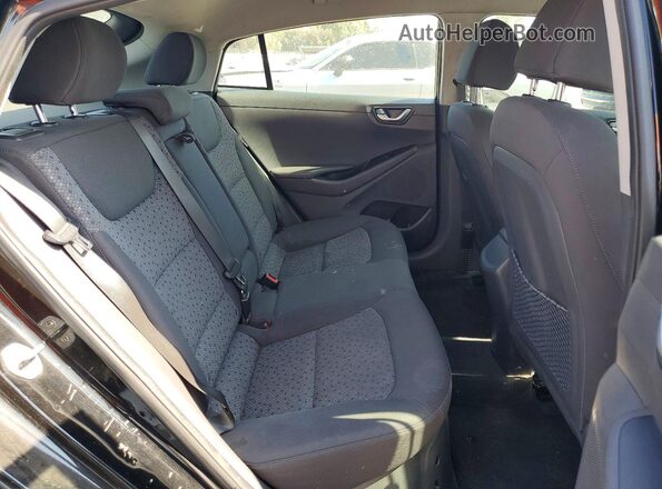 KMHC75LC4JU062650 2018 HYUNDAI IONIQ Black Vista de los asientos traseros