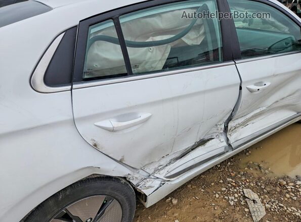 KMHC75LC5LU195579 2020 HYUNDAI IONIQ White Rear seats view