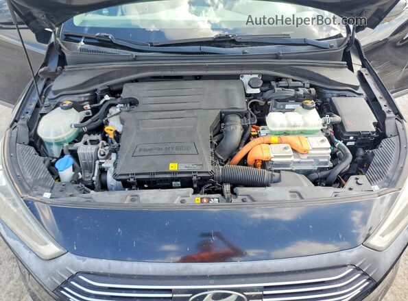 KMHC75LDXJU083818 2018 HYUNDAI IONIQ Black Rear interior view