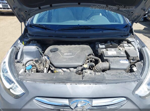 KMHCT4AE0GU997618 2016 HYUNDAI ACCENT Gray Rear view