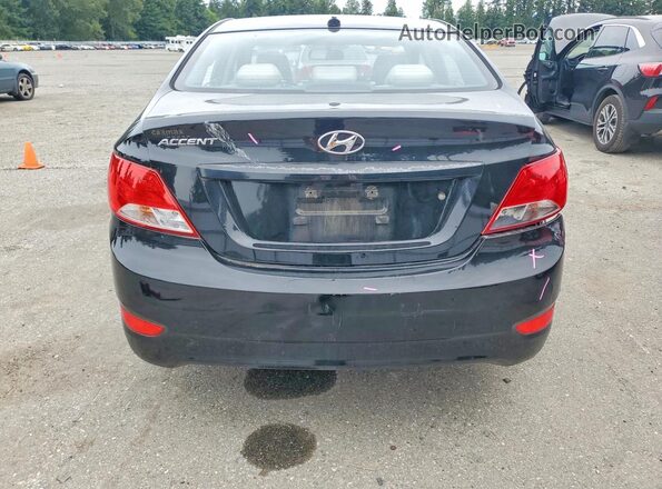 KMHCT4AE1GU053021 2016 HYUNDAI ACCENT Black Rear view