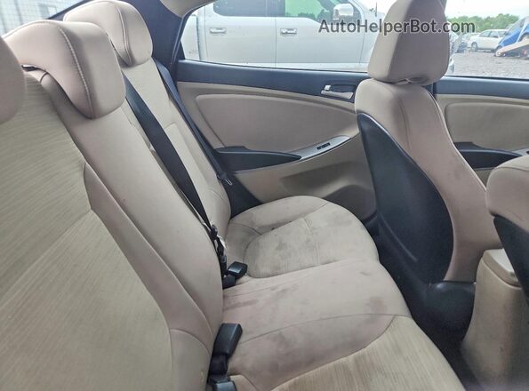 KMHCT4AE2HU374972 2017 HYUNDAI ACCENT Red Rear seats view
