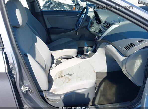 KMHCT4AE3GU017704 2016 HYUNDAI ACCENT Silver Front interior view