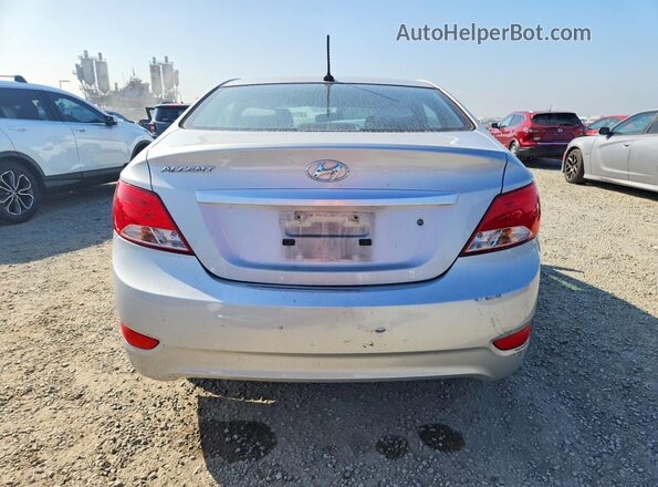 KMHCT4AE3GU096873 2016 HYUNDAI ACCENT Silver უკანა ხედი