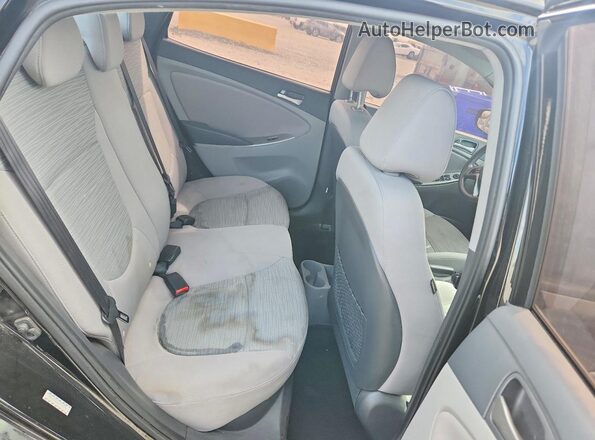 KMHCT4AE4GU973189 2016 HYUNDAI ACCENT Black Rear seats view