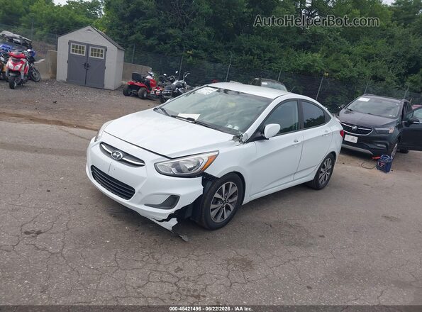 KMHCT4AE9HU334940 2017 HYUNDAI ACCENT White Front left