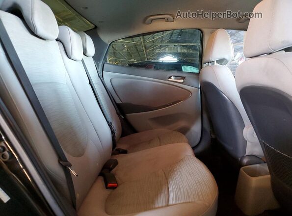 KMHCT4AEXHU337040 2017 HYUNDAI ACCENT Black Vista de los asientos traseros