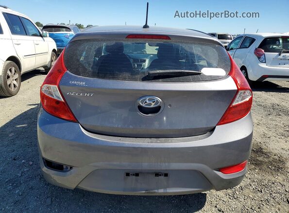 KMHCT5AE0GU250073 2016 HYUNDAI ACCENT Charcoal Rear view