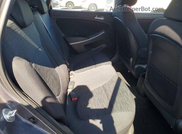 KMHCT5AE0GU250073 2016 HYUNDAI ACCENT Charcoal Rear interior view