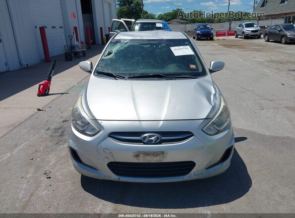 KMHCT5AE1GU257047 2016 HYUNDAI ACCENT Silver Սալոնի հետևի տեսք