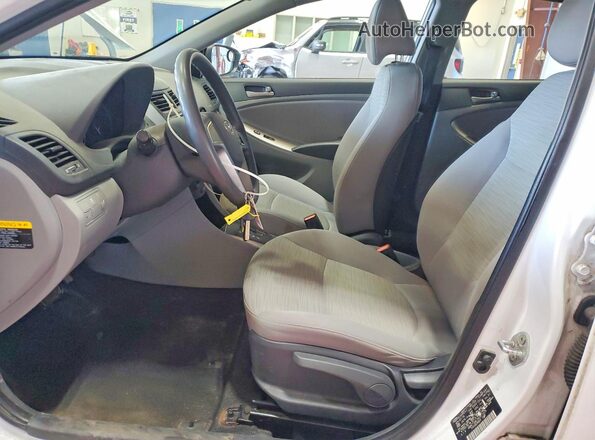 KMHCT5AE1HU311979 2017 HYUNDAI ACCENT White Front interior view