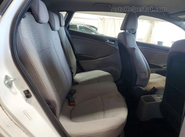 KMHCT5AE1HU311979 2017 HYUNDAI ACCENT White Rear seats view