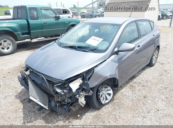 KMHCT5AE2HU319217 2017 HYUNDAI ACCENT Gray Vista tres cuartos delantera izquierda