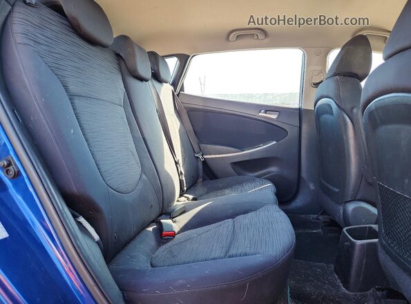 KMHCT5AE5HU325481 2017 HYUNDAI ACCENT Blue Rear seats view